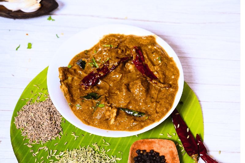 Spicy Chettinad chicken curry cooked with hand-pounded spices