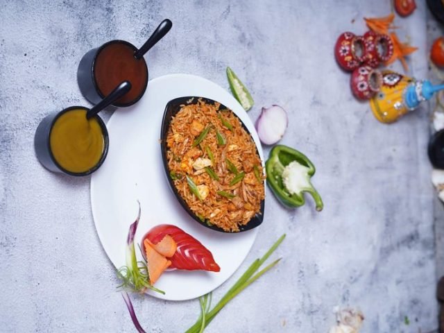 Sivakannan Restaurant - Authentic Schezwan Chicken Fried Rice